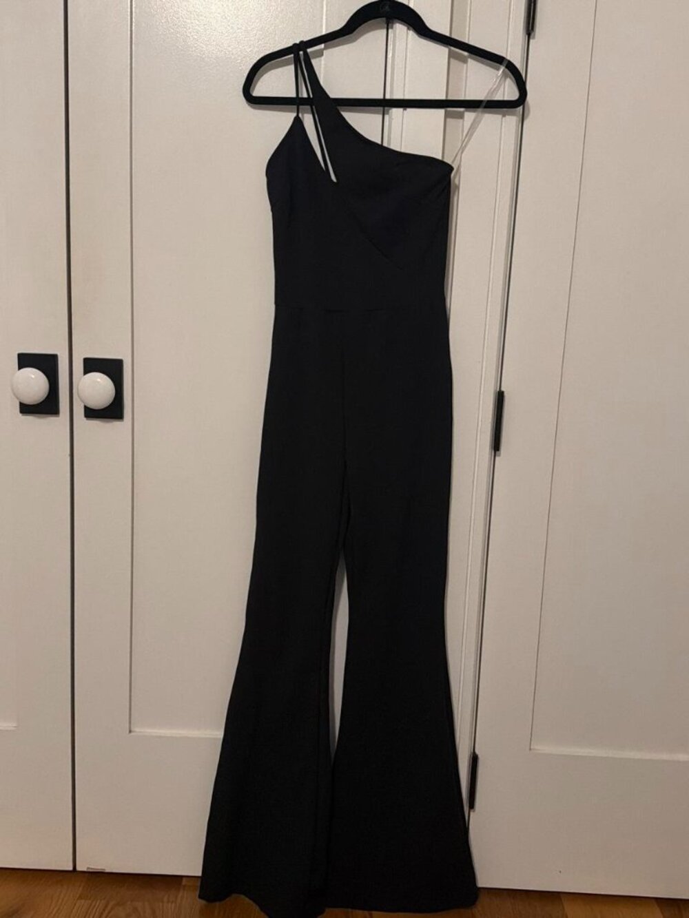 Black one shoulder jumpsuit with flared legs